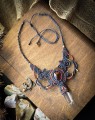 naszyjnik z bursztynem i kryształem górskim w formie podwójnego grotu, artystyczna biżuteria boho, rękodzieło premium, kolia damska handmade
